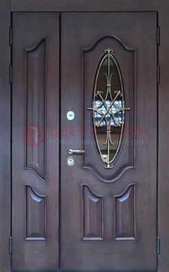 Темная металлическая дверь Винорит со стеклом и ковкой ДСК-239 в Реутове