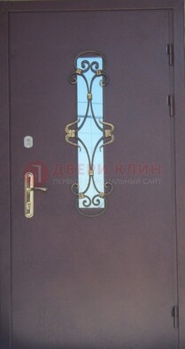 Металлическая дверь со стеклом и ковкой ДСК-77 в Реутове