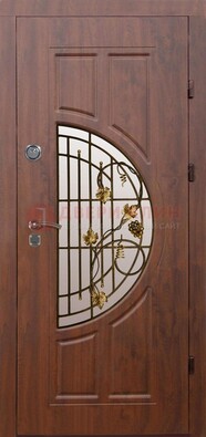 Стальная коричневая дверь с виноритом и ковкой ДВТ-82 в Реутове